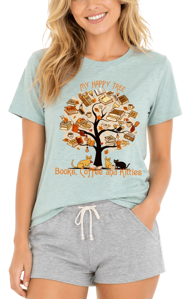 Woman wearing a light blue t-shirt with a tree graphic and text, paired with gray shorts.